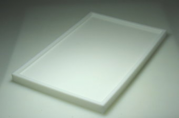 The picture shows a flat silicone mold. This mold can be used to cast wax slabs.